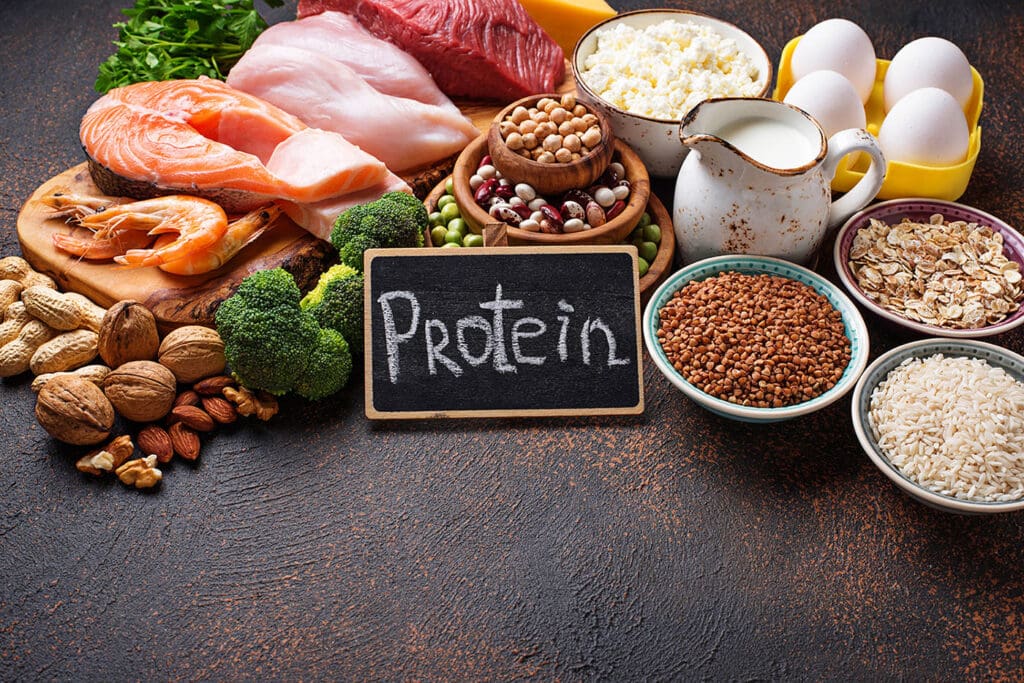 Healthy foods high in protein are displayed on a table